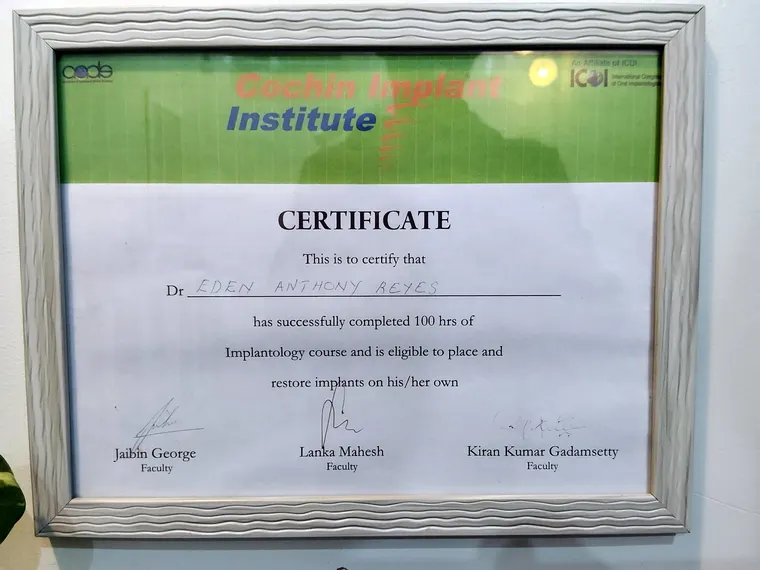 Cochin Implant Institute certificate confirming Dr. Eden Anthony Reyes completed 100 hours of implantology and is eligible to place and restore implants on his own