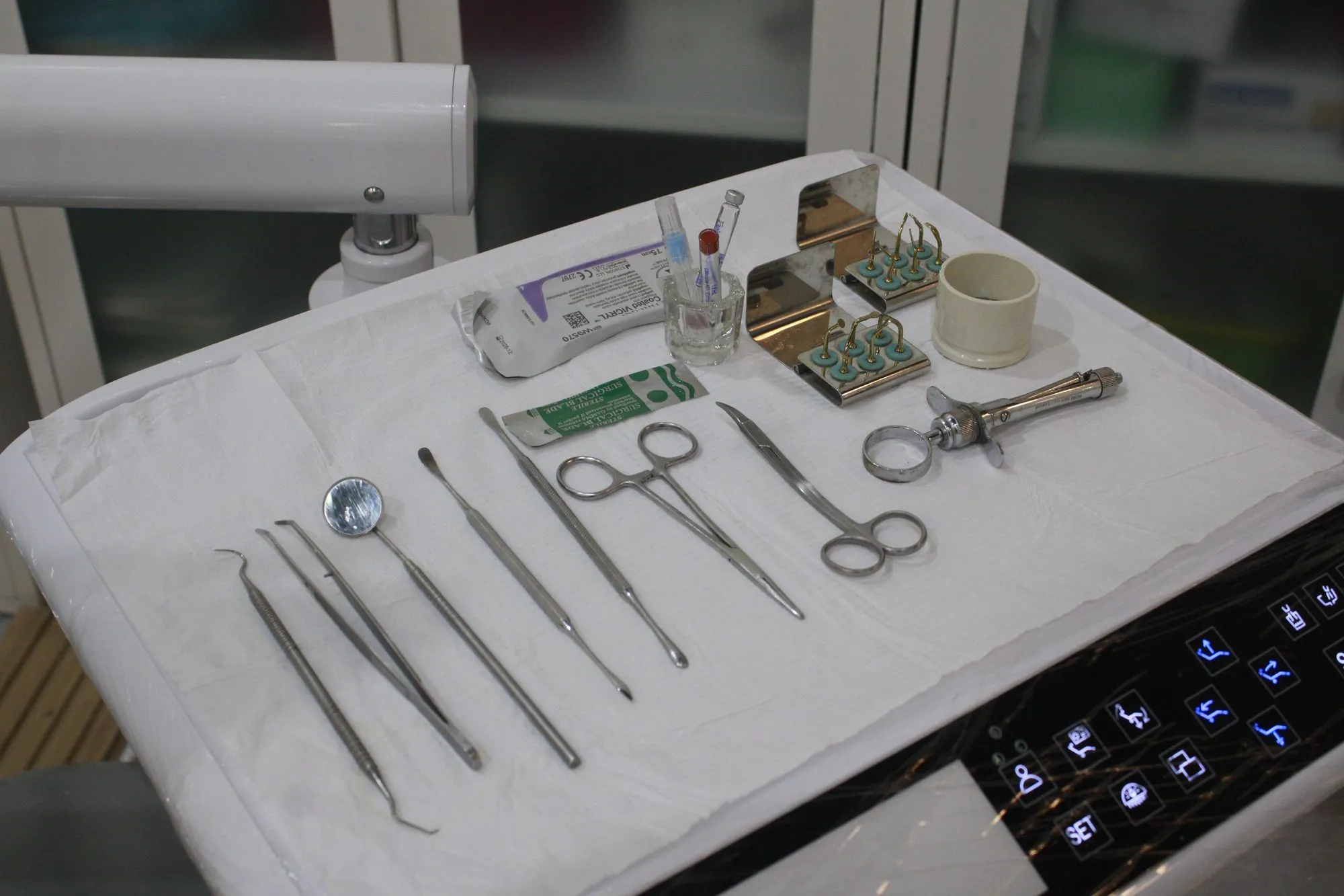 Sterile oral surgery instrument tray laid out in the treatment room at iDent Dental Lounge, Cagayan de Oro
